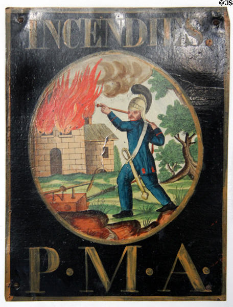 Insurance Company sign displaying firefighter (late 19thC) at Carnavalet Museum. Paris, France.