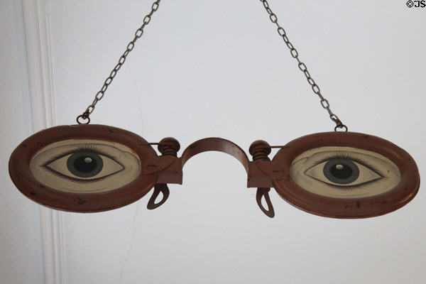 Large pair of glasses used as sign of an optician (early 20thC) at Carnavalet Museum. Paris, France.