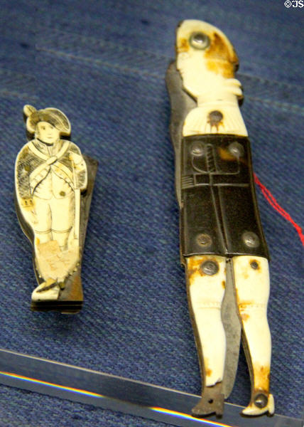 Two penknives decorated as Guardsmen of the Revolutionary period made of ivory & steel at Carnavalet Museum. Paris, France.