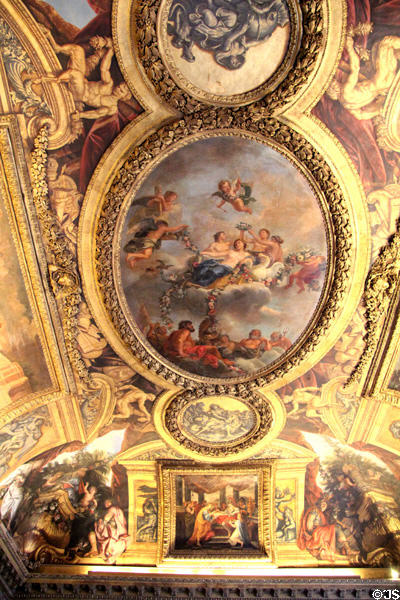 Crowning of Venus baroque ceiling painting (1683) by René-Antoine Houasse in Venus room at Versailles Palace. Versailles, France.