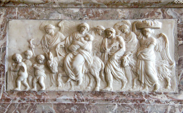 Stone relief of flight into Egypt at Versailles Palace. Versailles, France.