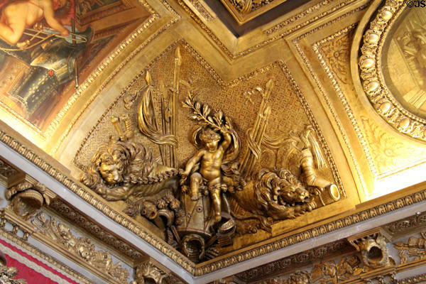 Baroque ceiling decoration in Mars room at Versailles Palace. Versailles, France.