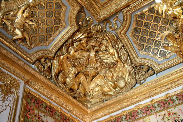 Carvings on ceiling in Queen's Bedroom at Versailles Palace. Versailles, France.