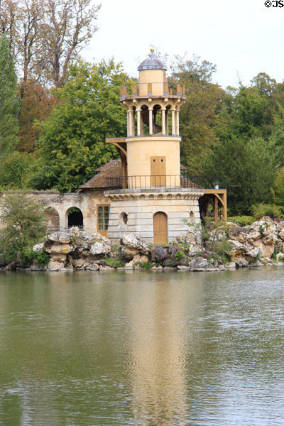 Marlborough Tower in shape of lighthouse over pond at Marie Antoinette farm. Versailles, France.