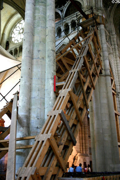 Large brace rising from floor at 45 degree angle to give support to pillars which hold up vault at Cathédrale St-Pierre. Beauvais, France.