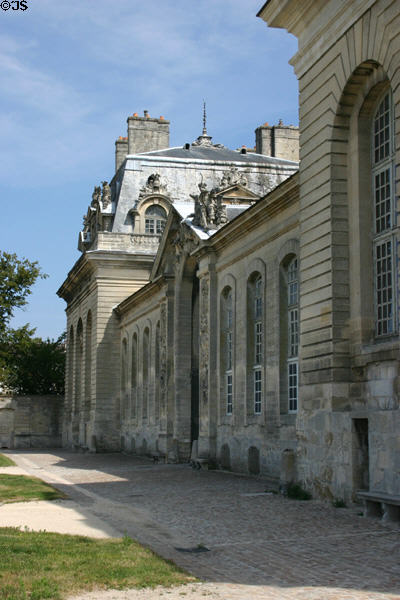 Side facade of Grand Stables at Château de Chantilly. Chantilly, France.