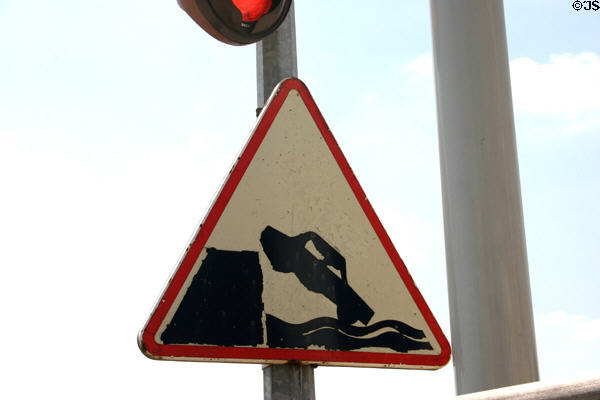Warning sign of risk of car falling into Seine River. Jumièges, France.