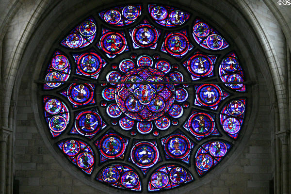 East rose window dedicated to Mary with 12 Apostles & 24 Elders surrounding her in Cathédrale Notre-Dame. Laon, France.