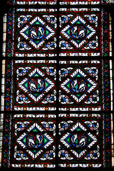 Griffins stained glass window at St-Denis Basilica. St Denis, France.