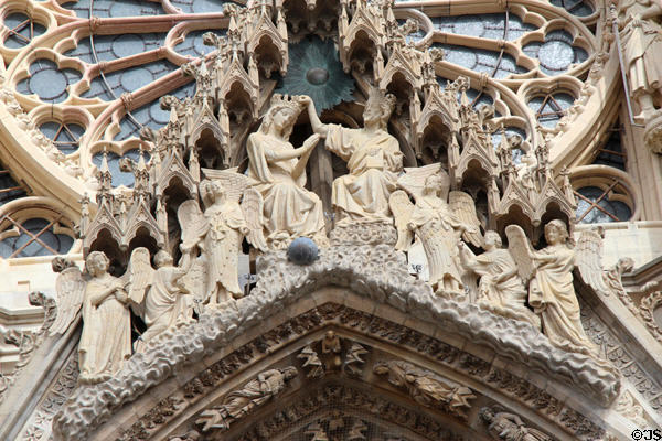 Coronation of Virgin Mary carving (copy 1955) by Georges Saupique in central portal of Reims Cathedral. Reims, France.
