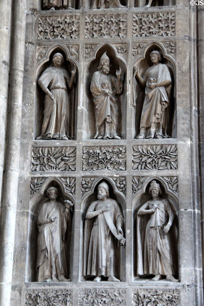 Panel from statuary framing small rose window in Reims Cathedral. Reims, France.