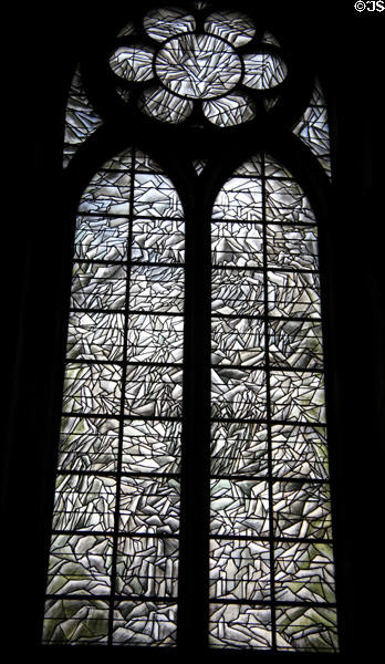 Modern black & white stained glass window at baptismal font of Reims Cathedral. Reims, France.