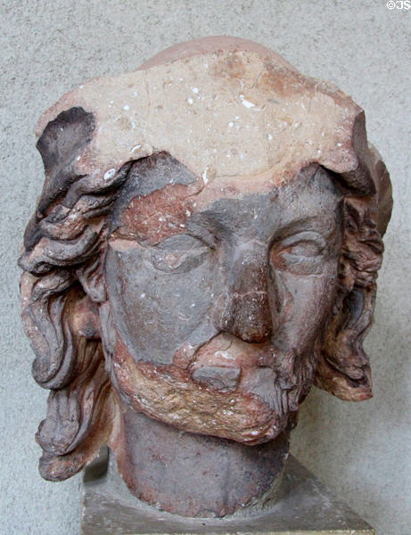Head of Christ in pilgrim dress statue (1260-90) removed from west facade of Reims Cathedral at Tau Palace Museum. Reims, France.