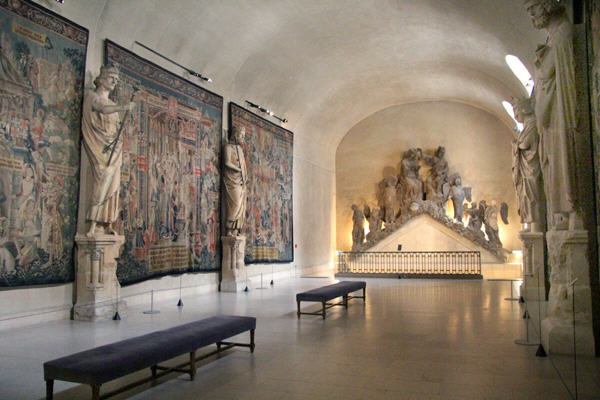 Gallery with tapestries & statues at Tau Palace Museum. Reims, France.