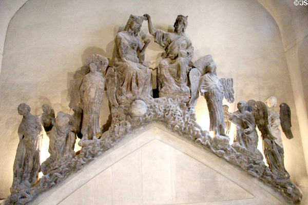 Coronation of Virgin Mary carving (c1260) from gable of central doorway of Reims Cathedral at Tau Palace Museum. Reims, France.
