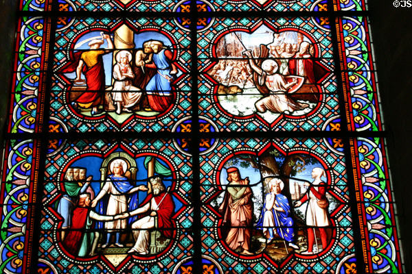 Stained glass window with scenes from life of St Louis in Notre Dame Cathedral. Senlis, France.