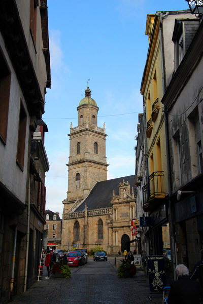 Narrow street of old Auray with view of St. Gildas Church. Auray, France.