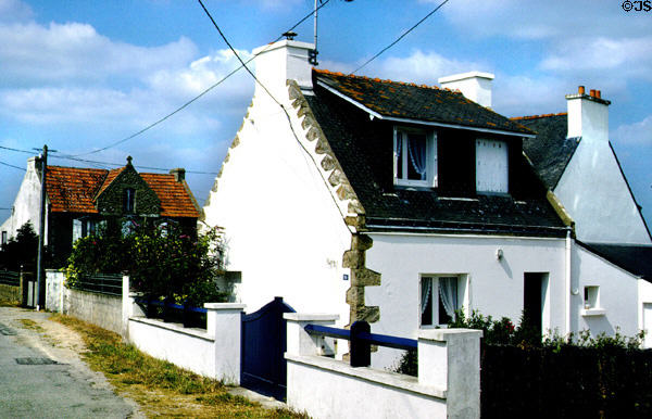 Typical Brittany dwellings alongside road. Carnac, France.