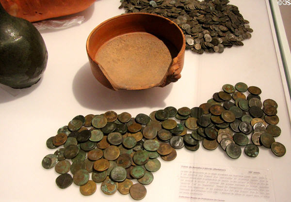 Cache of coins (3rdC) from Gâvres, Morbihan with some dating back to Hadrian (117-138) at Archeology Museum of Morbihan. Vannes, France.