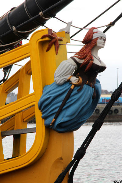 Figurehead of woman with eye patch & cane on frigate Étoile du Roy. St Malo, France.