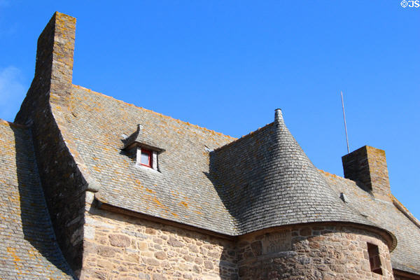 Steep slate roof on manor house, originally thatched roof until 19thC, at Jacques Cartier Manor House Museum. St Malo, France.