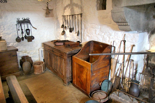 Kitchen utensils & breadbox in kitchen at Jacques Cartier Manor House Museum. St Malo, France.