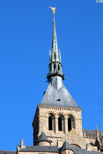 Spire of Mont-St-Michel abbey crowned by Archangel Michael (late 19thC) by Emmanuel Frémiet. Mont-St-Michel, France.