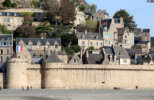 Mont-St-Michel town guarded by walls. Mont-St-Michel, France.