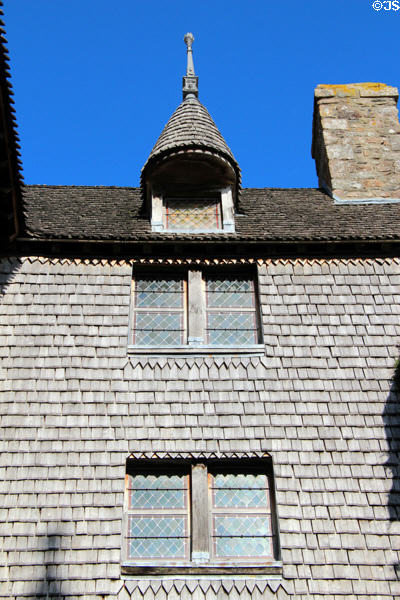 House covered with wooden shingles along Grande Rue. Mont-St-Michel, France.