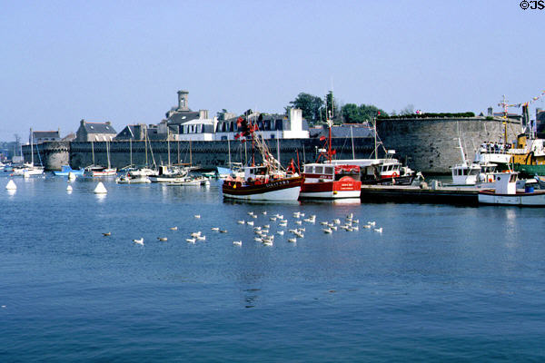Fishing port, one of France's largest, & walls of old town. Concarneau, France.