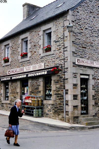 Stone building, in Brittany style, on St Thégonnec shopping street. St Thégonnec, France.