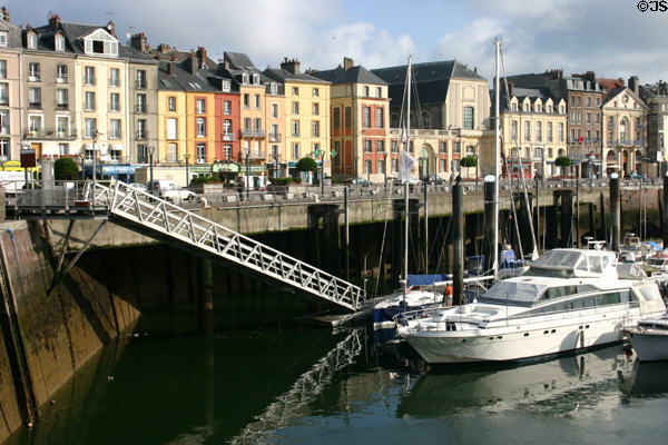 Waterfront buildings with boat ladder in foreground. Dieppe, France.