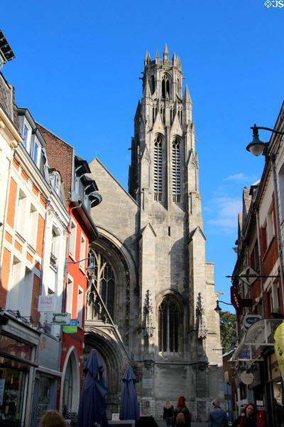 St-Jean-Baptiste church bell tower seen at end of streetscape. Arras, France.