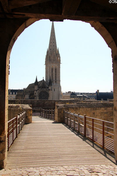 St Peter's Catholic Church (13thC) seen through arch of Caen Castle. Caen, France.