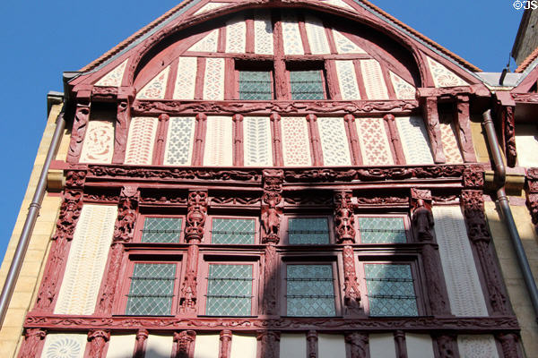 Carving detail of facade on half-timbered house (16thC) on St-Pierre Street. Caen, France.