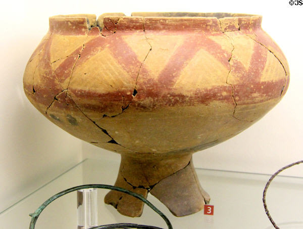 Gallic ceramic vase with tripod feet & geometric painting (6thC BCE) found in tomb of Eterville, Calvados at Museum of Normandy. Caen, France.