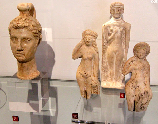 Ceramic statuettes of Venus or females used in local burials (1st-3rdC CE) at Museum of Normandy. Caen, France.