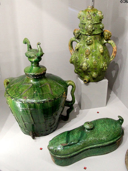 Terra cotta green glazed water dispensers (1771) & rabbit terrine "gîte à lièvre" (19thC) by Pré-d'Auge potters at Museum of Normandy. Caen, France.