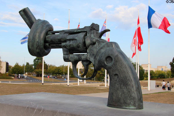 Non-Violence: Knotted Gun sculpture by Carl Fredrik Reuterward at Caen Memorial. Caen, France.