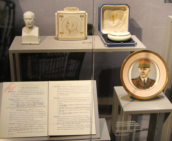 Vichy France leader Marshal Pétain ceramic commemorative items & document defining Vichy Jewish draft status laws (1940) in collaboration with Germans at Caen Memorial. Caen, France.