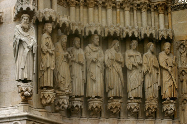 Saints carved to left of central portal of Amiens Cathedral. Amiens, France.