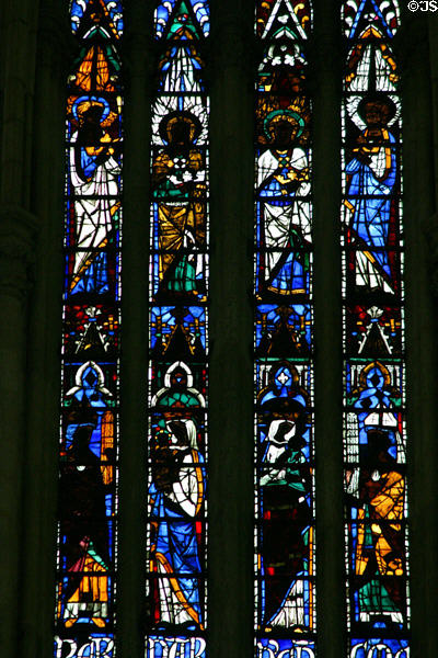 Saints under north transept rose window at Amiens Cathedral. Amiens, France.