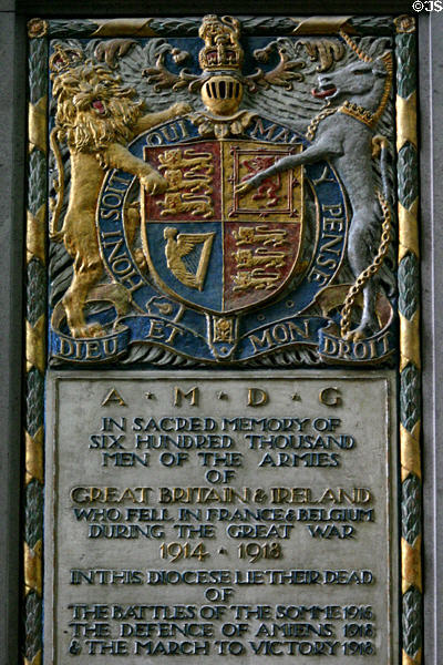 Memorial plaque with British coat of arms commemorating British & Irish soldiers who died on French battlefields during WWI at Amiens Cathedral. Amiens, France.