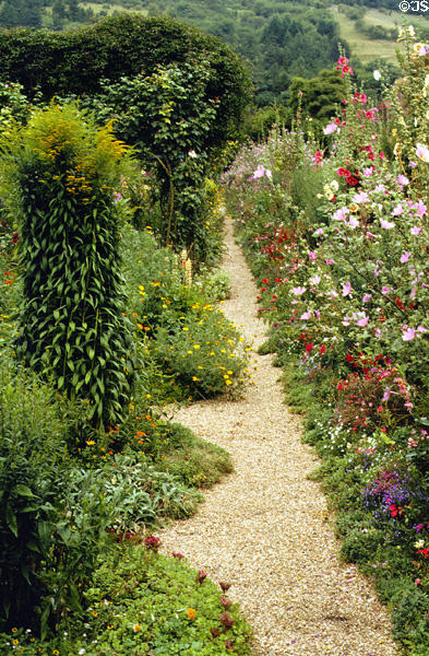 Path through flower garden created by Claude Monet at Giverny. Giverny, France.