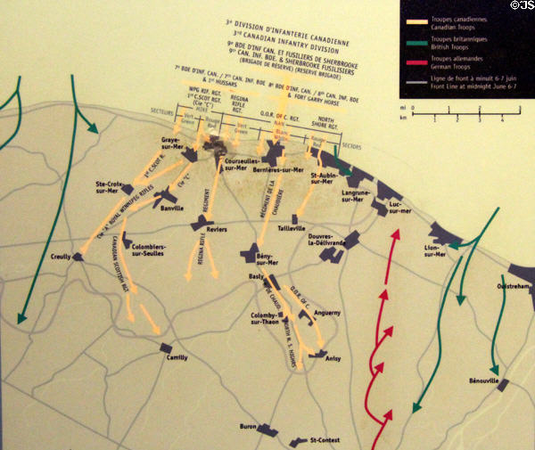 D-Day (June 6, 1944) Juno beach (8km wide) map of Canadian occupation (yellow lines) by midnight with Brits (green) & Germans (red) at Juno Beach Centre. Courseulles-sur-Mer, France.