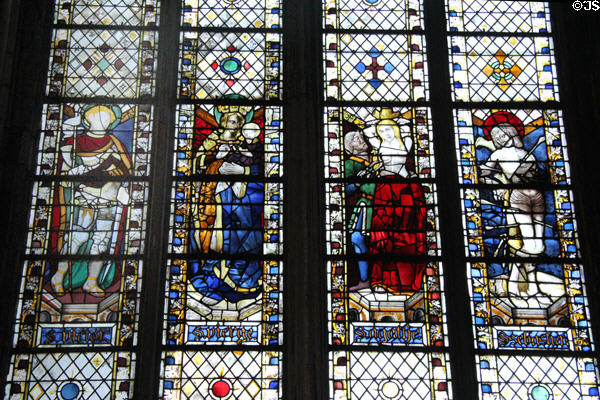 Stained glass windows (1465-70) by Guillaume Barbe of St Victor, Virgin & Child, St Agatha & St Sebastian at Rouen Cathedral. Rouen, France.