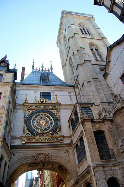 Great Clock archway & clock face beside belfry tower. Rouen, France.