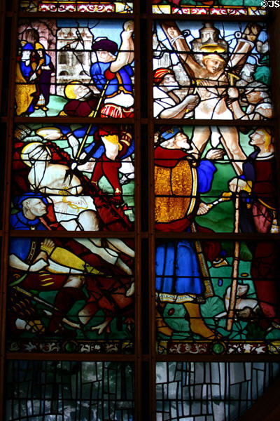 Stained-glass windows (16thC) with scenes of martyred saints at St Joan of Arc Church. Rouen, France.