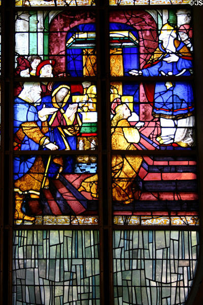 Scene with saint in stained-glass windows (16thC) at St Joan of Arc Church. Rouen, France.