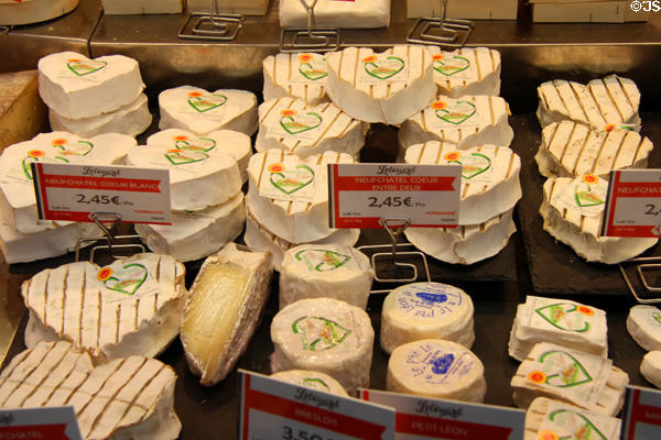 Normandy cheeses at St. Joan of Arc open-air marketplace. Rouen, France.